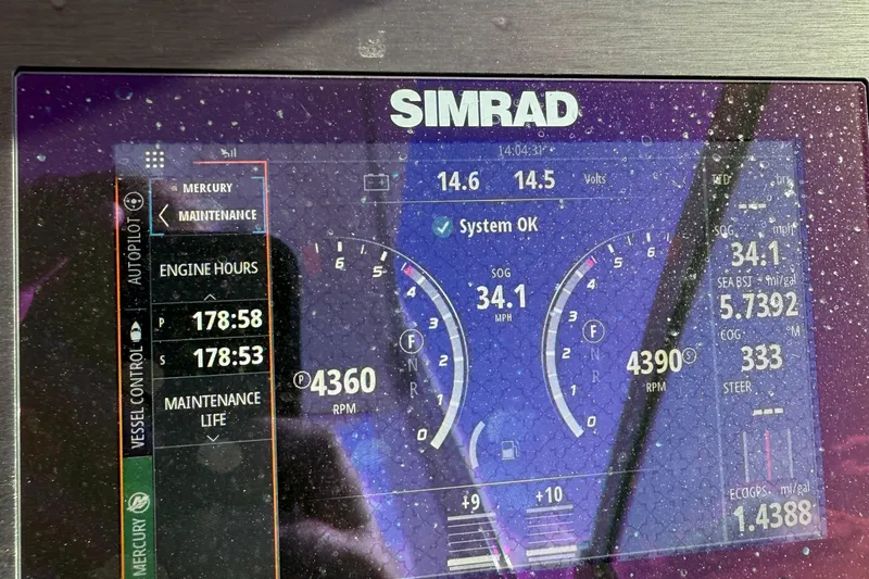 Yacht Photos Pics Simrad display on 2021 Aviara AV32 OB showing engine metrics and system status.