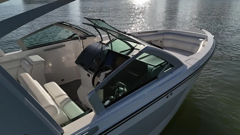  Yacht Photos Pics 2021 Aviara AV32 OB boat interior with sleek design on calm water.