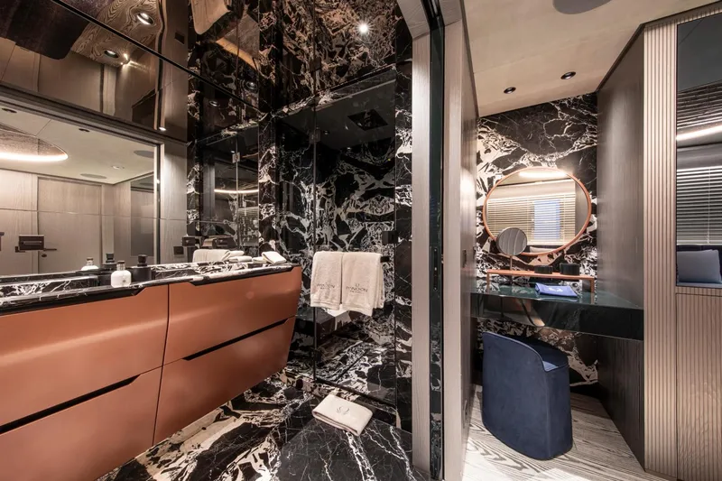 Pandion Pearl Yacht Photos Pics Luxurious bathroom on 2021 Sanlorenzo 44 Alloy yacht with elegant marble and modern fixtures.
