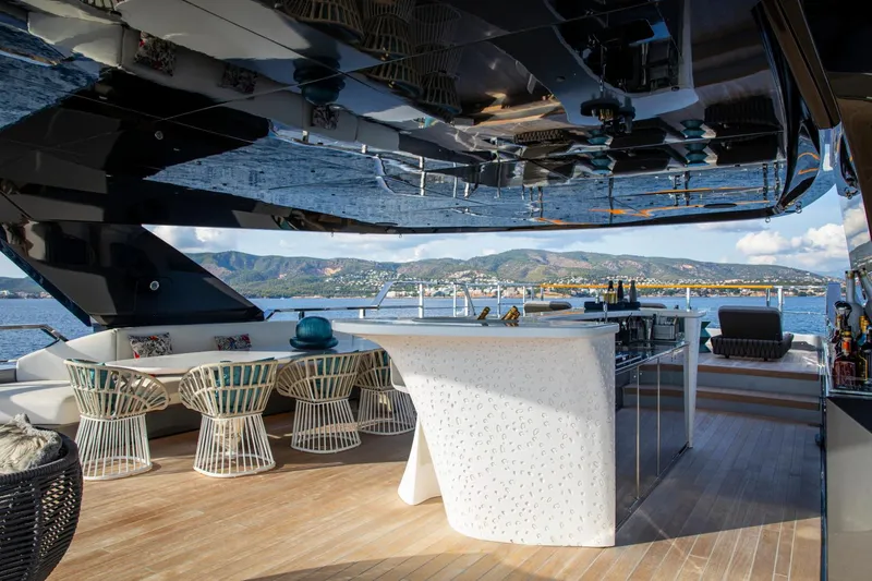 Pandion Pearl Yacht Photos Pics Luxurious 2021 Sanlorenzo 44 Alloy yacht deck with modern seating and bar area.