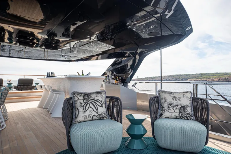 Pandion Pearl Yacht Photos Pics Luxurious Sanlorenzo 44 Alloy yacht deck with elegant seating and ocean view, 2021 model.
