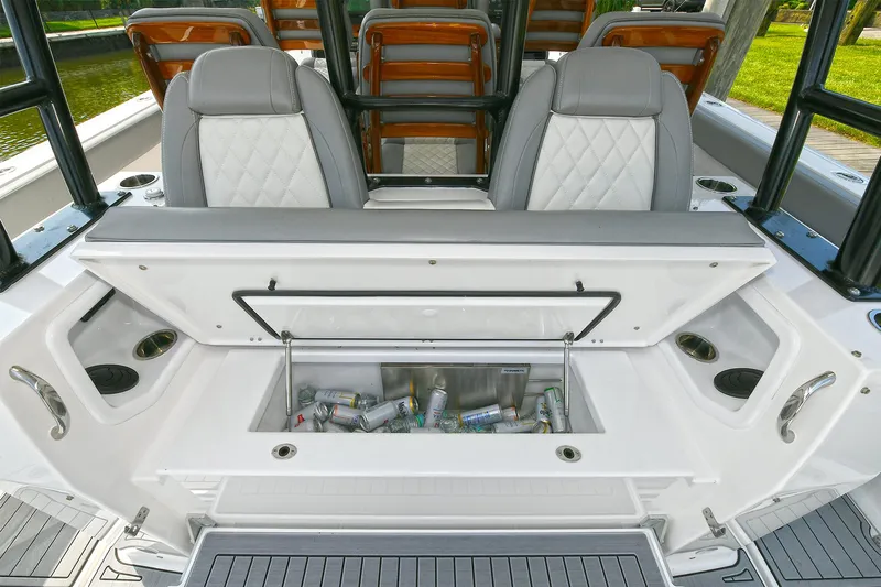 Fourtuna 2 Yacht Photos Pics 2023 Everglades 455 Center Console boat with open cooler and seating.