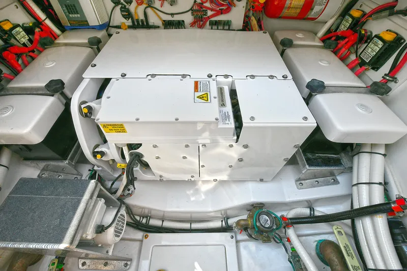 Fourtuna 2 Yacht Photos Pics 2023 Everglades 455 Center Console engine compartment with wiring and components.