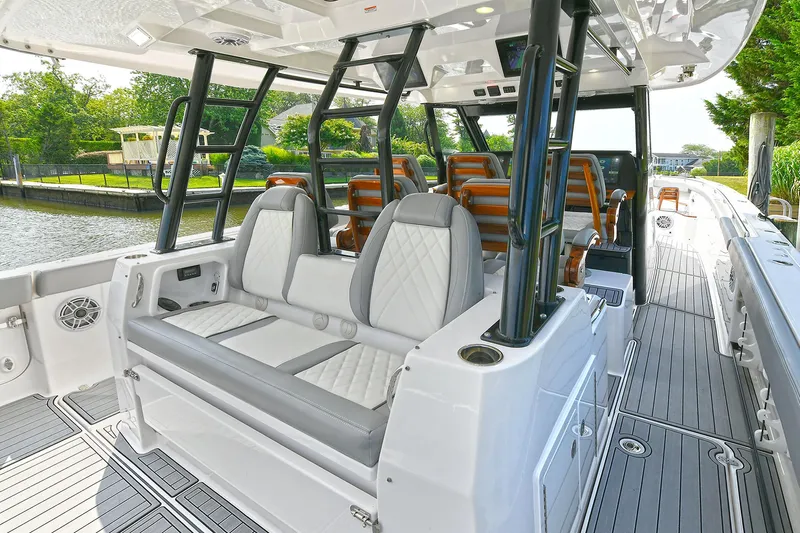 Fourtuna 2 Yacht Photos Pics 2023 Everglades 455 Center Console boat interior with luxurious seating and sleek design.