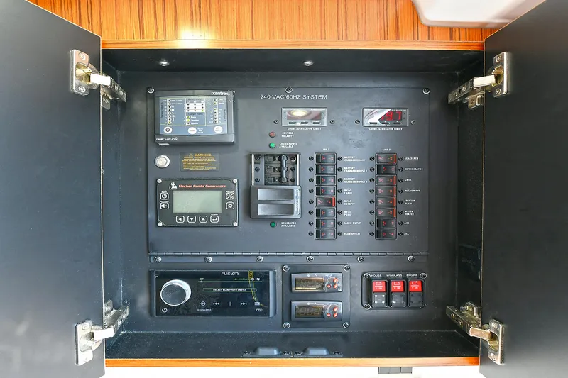 Fourtuna 2 Yacht Photos Pics Electrical control panel inside 2023 Everglades 455 Center Console boat.