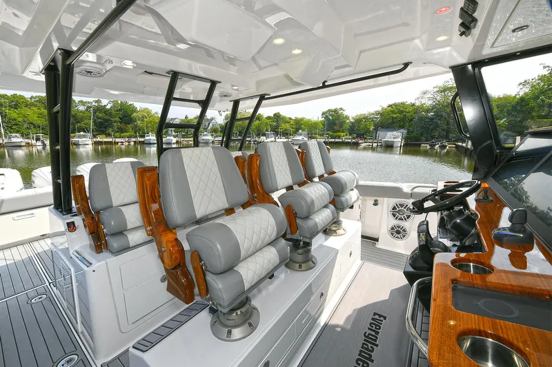 Fourtuna 2 Yacht Photos Pics 2023 Everglades 455 Center Console boat interior with luxurious seating and modern design.
