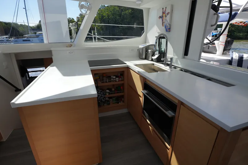 Talise Yacht Photos Pics Modern kitchen interior on 2024 Balance 442 yacht with sleek countertops and appliances.