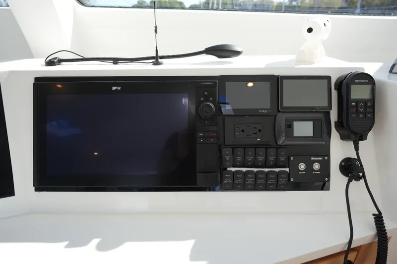 Talise Yacht Photos Pics 2024 Balance 442 yacht control panel with navigation and communication equipment.