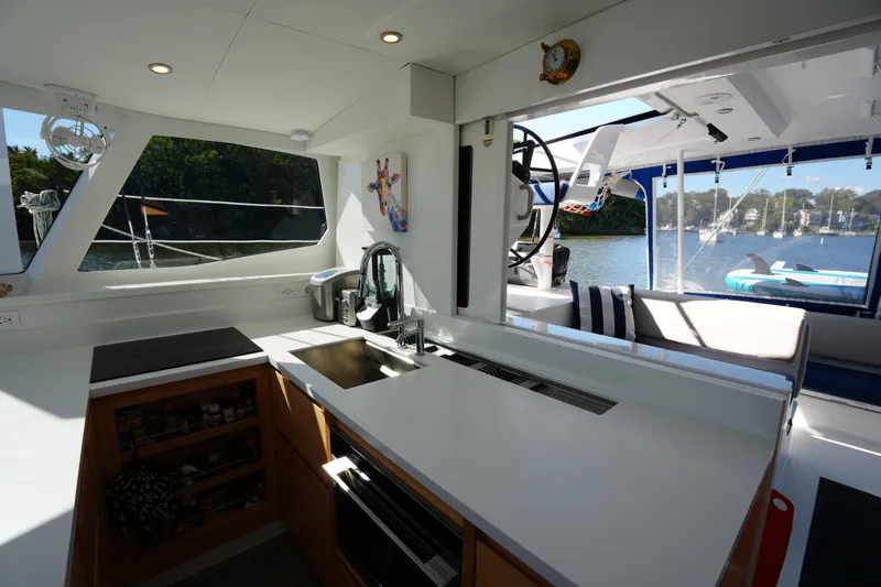 Talise Yacht Photos Pics Modern kitchen interior on 2024 Balance 442 yacht with scenic water view.