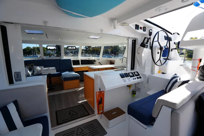 Talise Yacht Photos Pics 2024 Balance 442 yacht interior with modern design, spacious seating, and navigation controls.