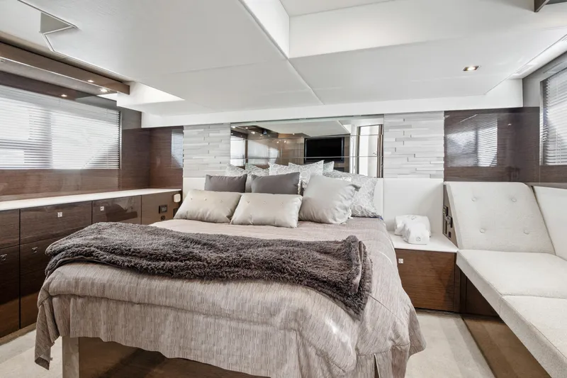  Yacht Photos Pics Luxurious bedroom interior of 2019 Cruisers 50 Cantius yacht with modern decor.