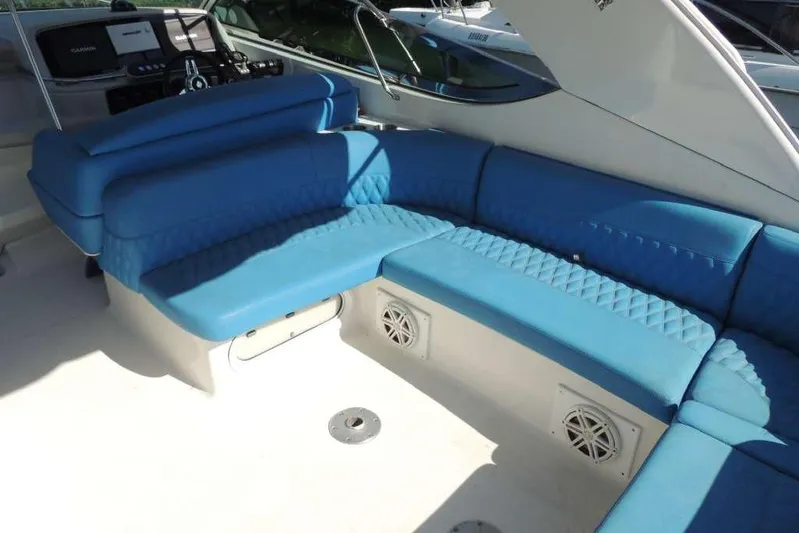  Yacht Photos Pics 2001 Formula 400 Super Sport boat with blue seating and modern dashboard.