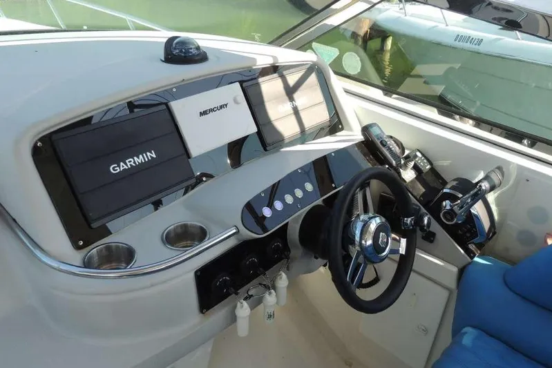  Yacht Photos Pics Control panel of a 2001 Formula 400 Super Sport boat with Garmin and Mercury displays.