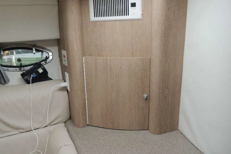  Yacht Photos Pics Interior of 2001 Formula 400 Super Sport boat with wood paneling and seating.