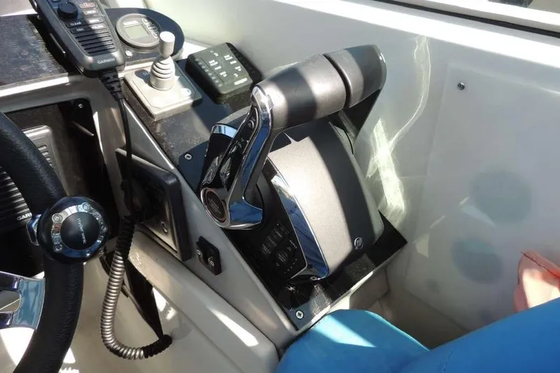  Yacht Photos Pics Control panel of a 2001 Formula 400 Super Sport boat with throttle and communication devices.