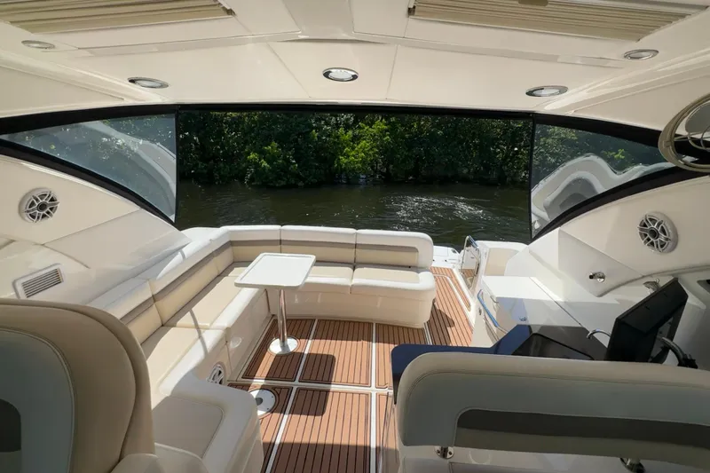  Yacht Photos Pics Luxurious 2012 Sea Ray 470 Sundancer yacht interior with elegant seating and scenic water view.