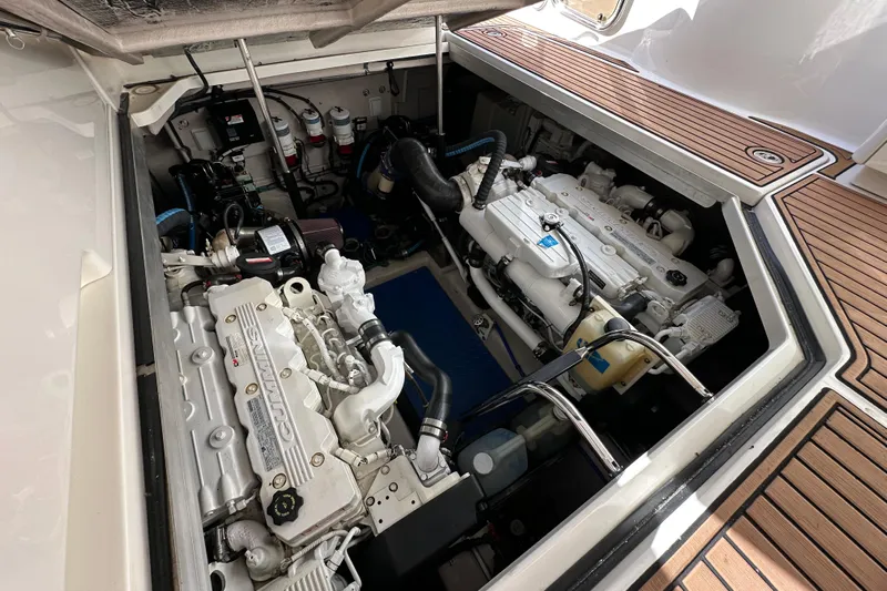  Yacht Photos Pics Engine compartment of 2012 Sea Ray 470 Sundancer, featuring Cummins engines and teak decking.