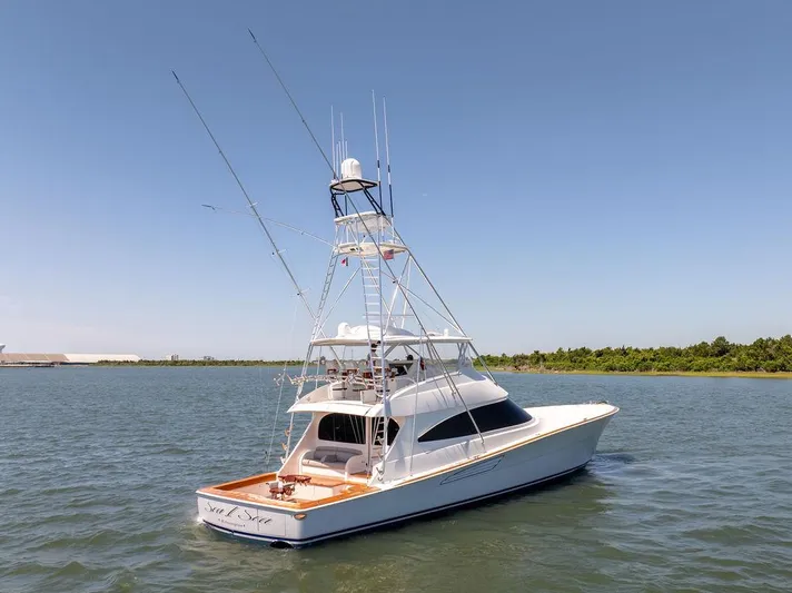 Sea I Sea Yacht Photos Pics 2017 Viking 72 Convertible yacht on calm waters with clear sky.
