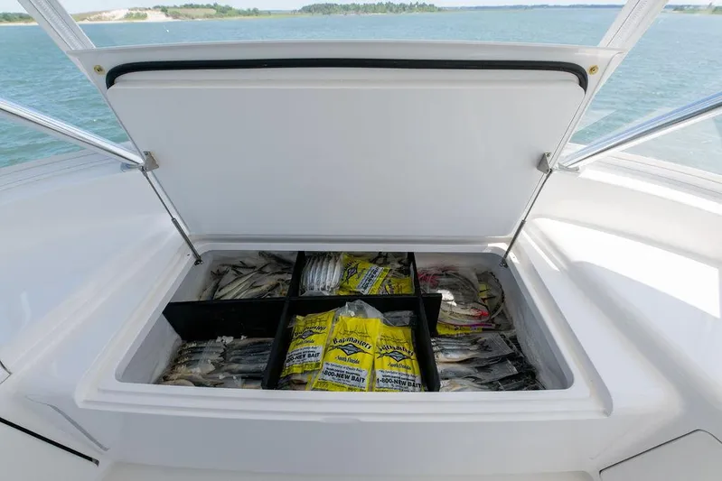 Sea I Sea Yacht Photos Pics Open storage compartment on 2017 Viking 72 Convertible boat filled with fishing bait.
