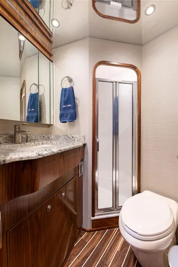 Sea I Sea Yacht Photos Pics 2017 Viking 72 Convertible yacht bathroom with shower, vanity, and toilet.
