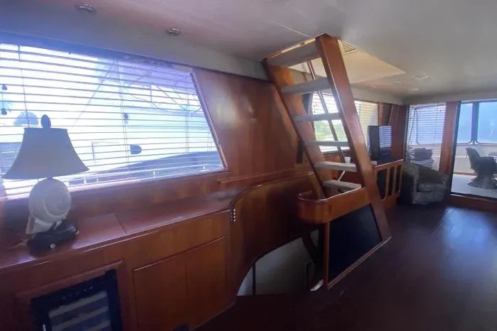 Sea Sharp Yacht Photos Pics Interior of 1990 Viking Motor Yacht with wooden finishes and modern decor.