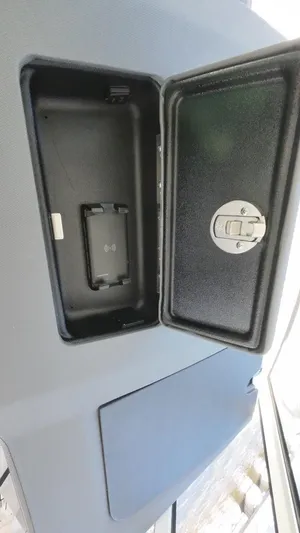 Happy Hour Yacht Photos Pics Open storage compartment in a 2022 Pursuit s428 boat.