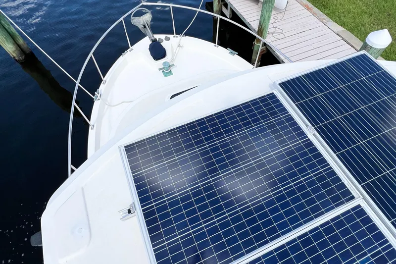 Mirage Yacht Photos Pics Nordic 32 boat with solar panels docked, 1999 model.