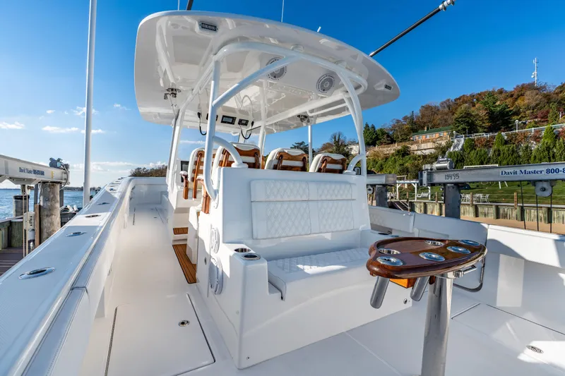  Yacht Photos Pics Front Runner 43 Catamaran 2025, sleek design, luxurious seating, docked by scenic waterfront.