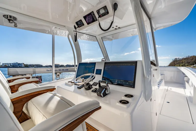  Yacht Photos Pics Luxurious helm of 2025 Front Runner 43 Catamaran with advanced navigation systems.