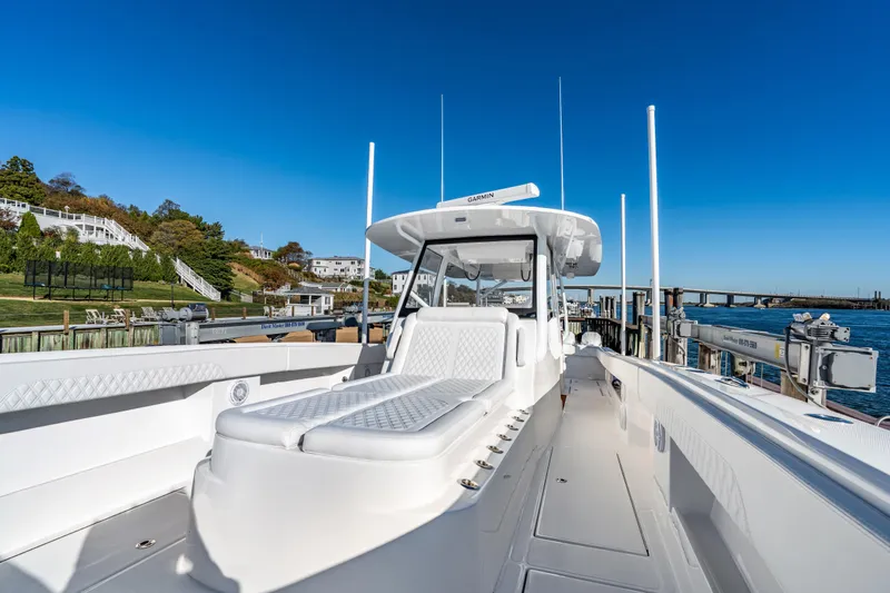  Yacht Photos Pics 2025 Front Runner 43 Catamaran docked, showcasing sleek design and spacious deck.