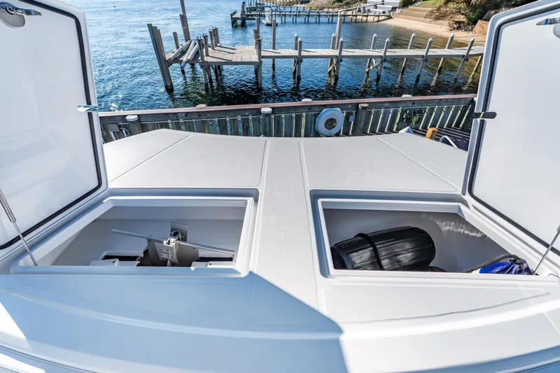  Yacht Photos Pics Open storage compartments on 2025 Front Runner 43 Catamaran, dockside view.