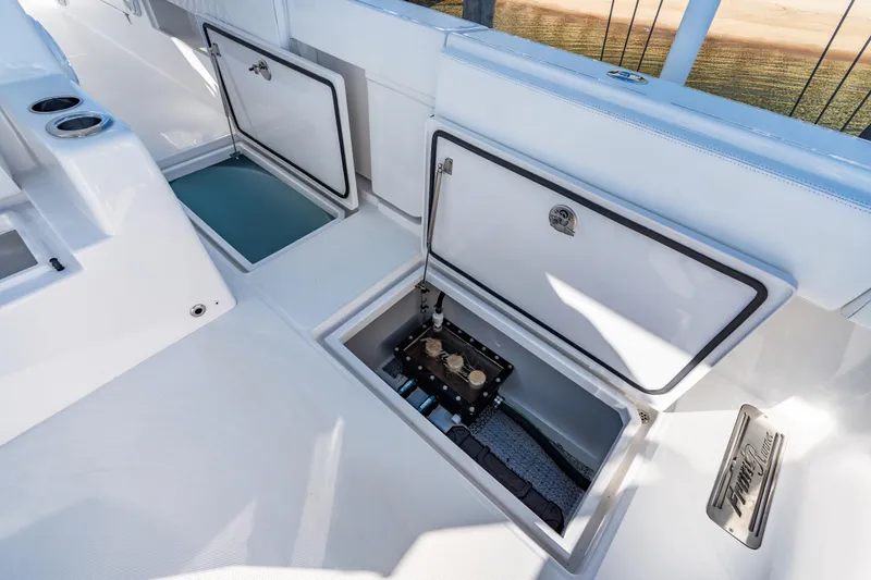  Yacht Photos Pics 2025 Front Runner 43 Catamaran deck with open storage compartments.