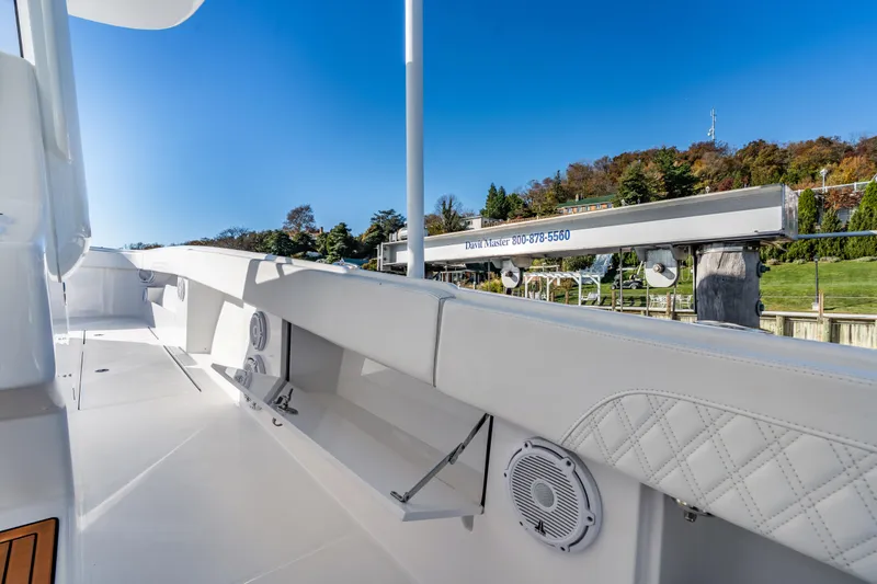  Yacht Photos Pics 2025 Front Runner 43 Catamaran deck with white seating and clear blue sky.