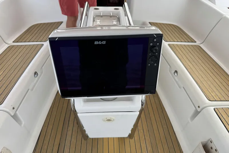 Kairos Yacht Photos Pics B&G navigation system on Jeanneau 409 sailboat with teak deck and seating.