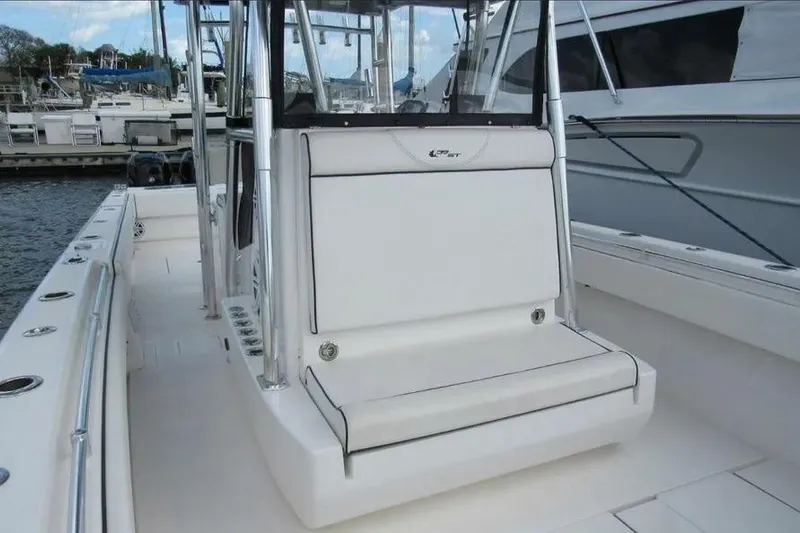  Yacht Photos Pics 2019 Contender 39 ST boat interior with seating, docked at marina.