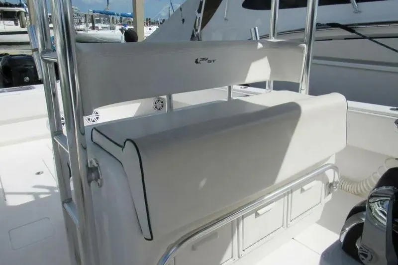  Yacht Photos Pics 2019 Contender 39 ST boat interior with seating and storage compartments.