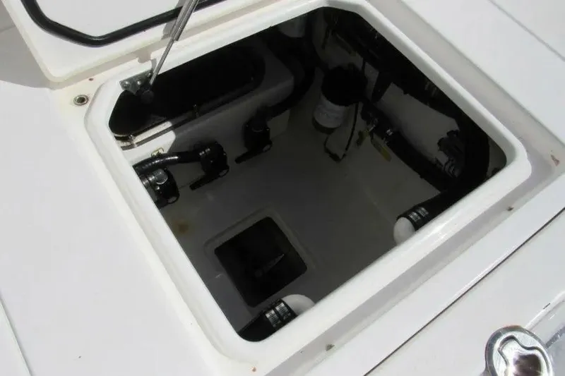  Yacht Photos Pics Open hatch of 2019 Contender 39 ST boat showing internal components and wiring.