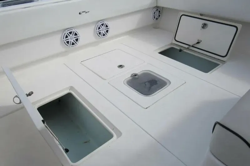  Yacht Photos Pics 2019 Contender 39 ST boat deck with storage compartments and speakers.