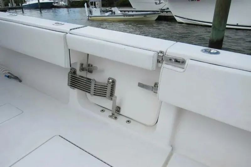  Yacht Photos Pics 2019 Contender 39 ST boat interior with white seating and stainless steel hardware.