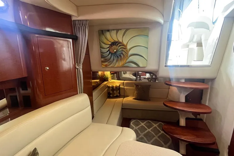 Chance Encounter Yacht Photos Pics Interior of 2004 Sea Ray 340 Sundancer with elegant seating and modern decor.