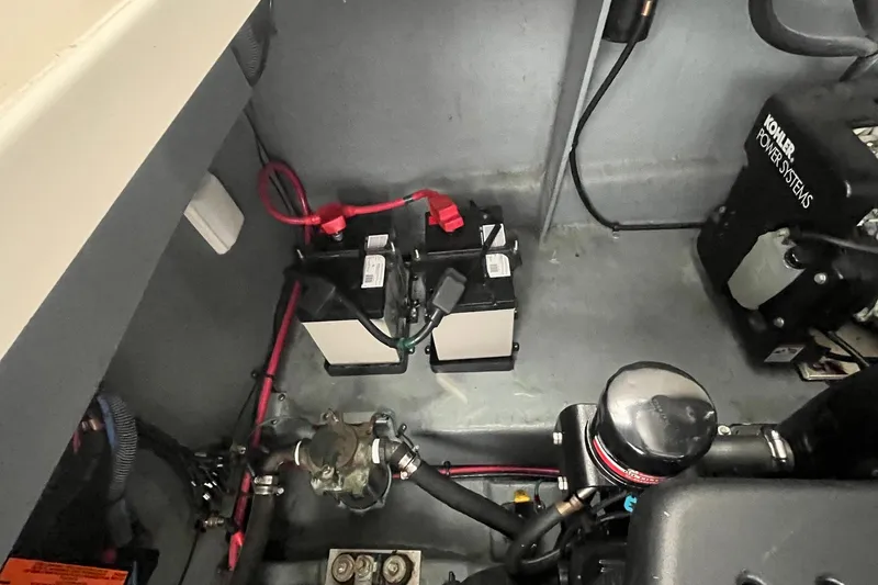 Chance Encounter Yacht Photos Pics Engine compartment of a 2004 Sea Ray 340 Sundancer with battery and power systems.