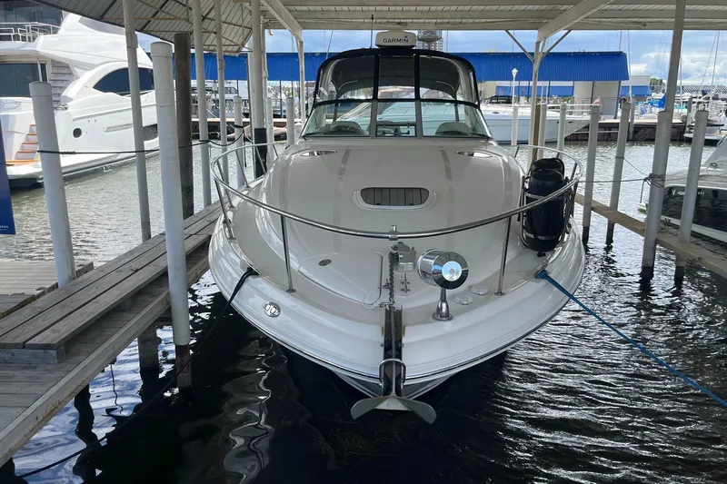 Chance Encounter Yacht Photos Pics 2004 Sea Ray 340 Sundancer docked in a marina, front view.