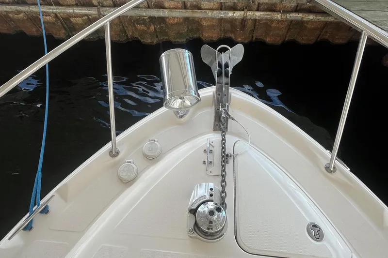 Chance Encounter Yacht Photos Pics Bow of 2004 Sea Ray 340 Sundancer with anchor and chain mechanism.