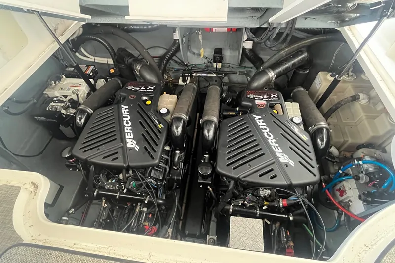 Chance Encounter Yacht Photos Pics Engine compartment of 2004 Sea Ray 340 Sundancer with twin Mercury engines.