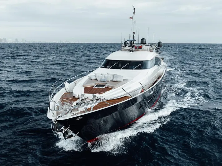 Burn Rate Yacht Photos Pics Luxury 2006 Palmer Johnson Express yacht cruising on open sea.