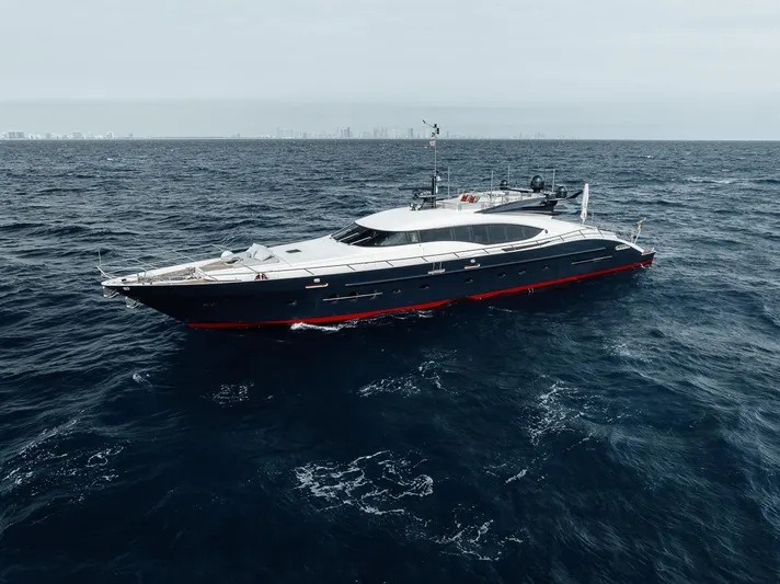 Burn Rate Yacht Photos Pics Luxurious 2006 Palmer Johnson Express yacht cruising on open sea.