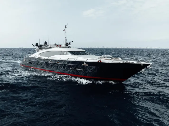 Burn Rate Yacht Photos Pics 2006 Palmer Johnson Express yacht cruising on open sea.