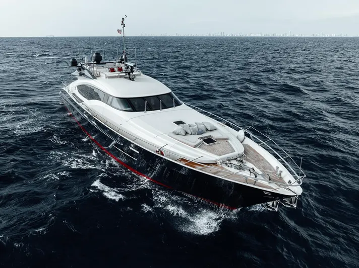 Burn Rate Yacht Photos Pics 2006 Palmer Johnson Express yacht cruising on open sea.