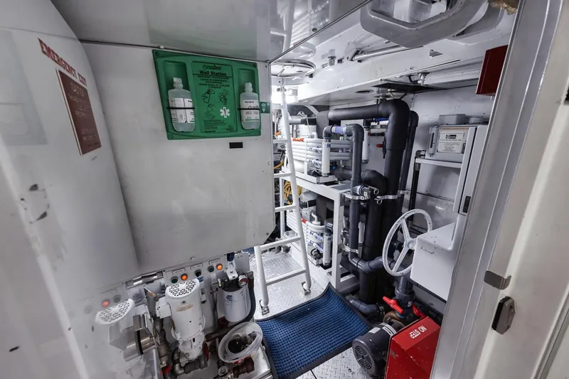 Burn Rate Yacht Photos Pics Engine room of 2006 Palmer Johnson Express yacht, featuring complex machinery and equipment.