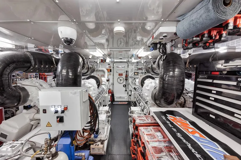 Burn Rate Yacht Photos Pics Engine room of a 2006 Palmer Johnson Express yacht, featuring advanced machinery and equipment.